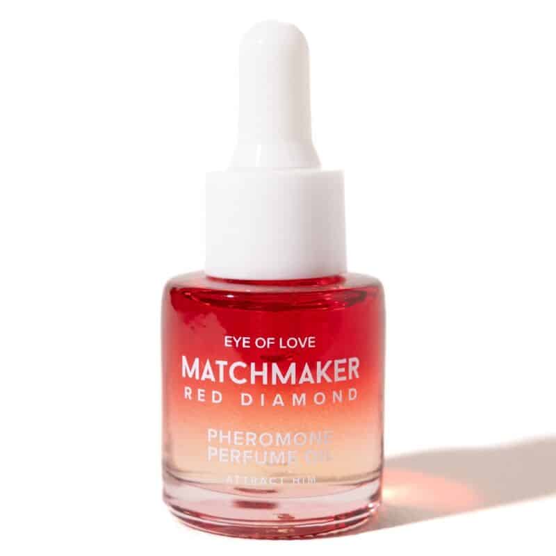 Frasco con cuentagotas de aceite perfumado EYE OF LOVE Matchmaker Red Diamond, en tonos rojos y anaranjados